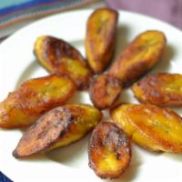 Fried Sweet Plantains · Vegetarian. With queso fresco and Mexican crème.