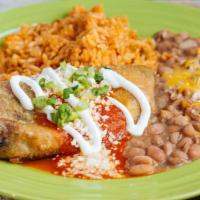 Chile Rellenos · Vegetarian. Twin roasted poblano peppers, Mexican cheeses, lightly battered and fried, tomat...