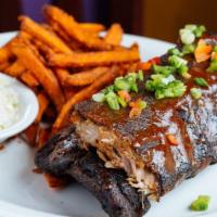 Half Rack Coffee Braised Baby Back Ribs · Chile and coffee-rubbed ribs, fall off the bone tender, house special BBQ sauce, cilantro sl...