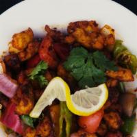Chhasha Solo · White chicken sautéed with red & green peppers, long hot pepper, fresh tomato & onion in chi...