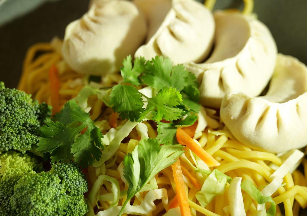 Chicken Momo And Noodle · Combination bowl
Steam dumplings and Stir fry noodles with vegetables