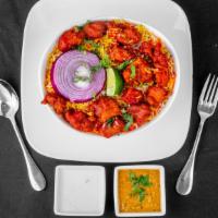 Chilly Chicken Biryani · Boneless chicken sautéed with fresh green chilies, onions and our signature chilli sauce lay...