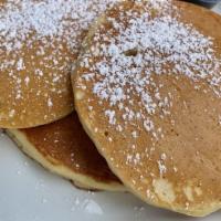Buttermilk Pancakes  · our house-made secret recipe.