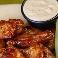 Honey Chipotle Bbq Wings Boneless · Barbecue sauced up with smoky chipotle peppers and a bit of honey.