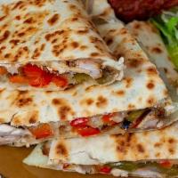 The Mad Mex® Quesadilla · Your choice of fresh grilled chicken breast, grilled steak, sauteed shrimp, marinated tofu o...