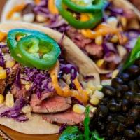 Grilled Street Corn & Steak Tacos · A summery version of our classic steak taco with grilled flank steak, grilled corn, chipotle...