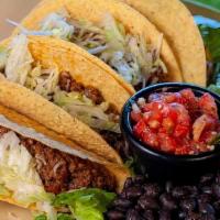 Nacho Momma'S Taco Platter · Looking for old school hard tacos? You found 'em! Four classically crunchy, gringo-style cor...