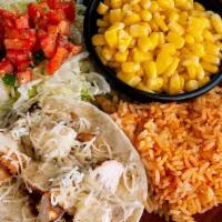 Tom'S Soft Taco · Choose grilled chicken or steak or taco beef.  With jack cheese, lettuce, Mexican rice and c...