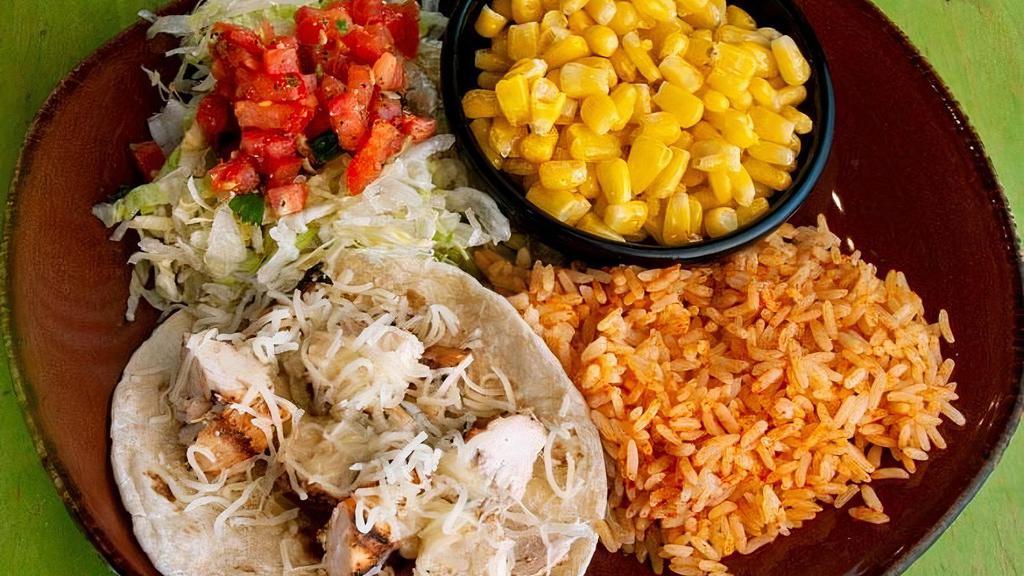 Tom'S Soft Taco · Choose grilled chicken or steak or taco beef.  With jack cheese, lettuce, Mexican rice and corn.