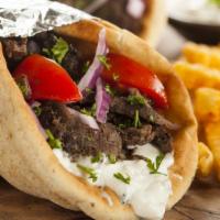 Beef Gyro Sandwich · Delicious beef gyro with tzatziki sauce made with romaine lettuce, tomato, red onion and par...