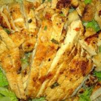 Grilled Chicken Caesar Salad · Romaine Lettuce, Croutons and Shredded Cheese.