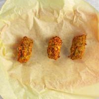 Falafel (6Pcs) · For the vegan and vegetarian lovers. Ground chickpeas and fava bean are seasoned with severa...
