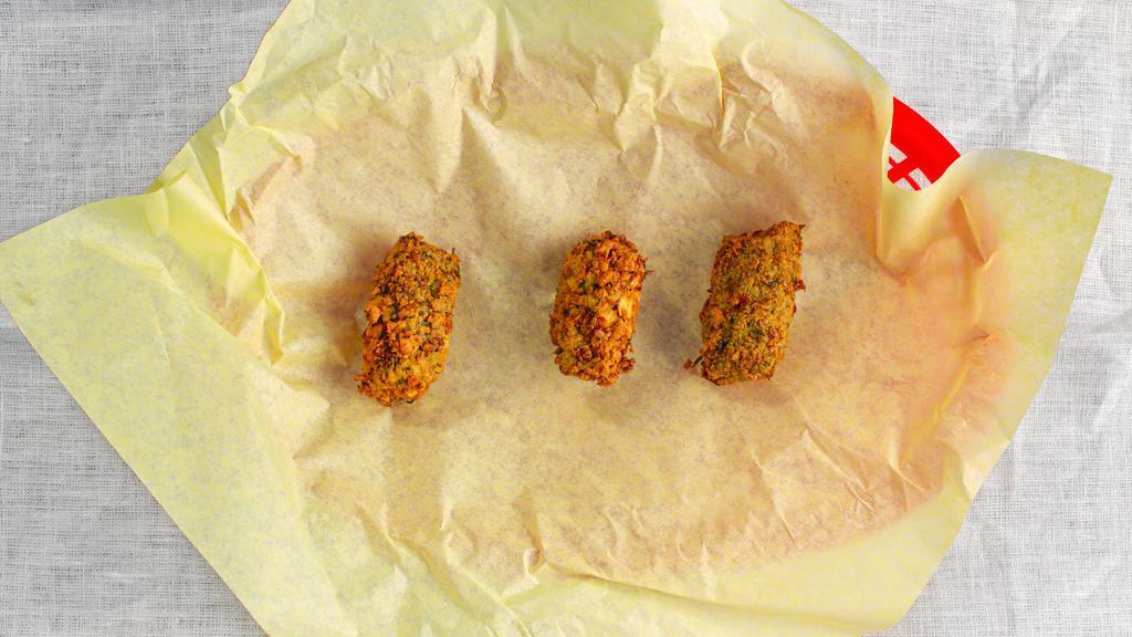 Falafel (6Pcs) · For the vegan and vegetarian lovers. Ground chickpeas and fava bean are seasoned with several spices of the Mediterranean with tahini.