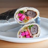 Kefta Kebab Rollup · Charbroiled ground lamb & beef with parsley onion and spices, served with Hommus, Lettuce, T...