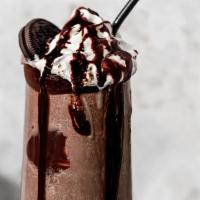 Oreo · espresso, cream, and real oreos blended with whip cream and chocolate drizzle