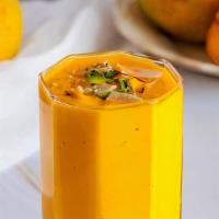 Mango (Smoothies) · organic mango chunks blended with our house base