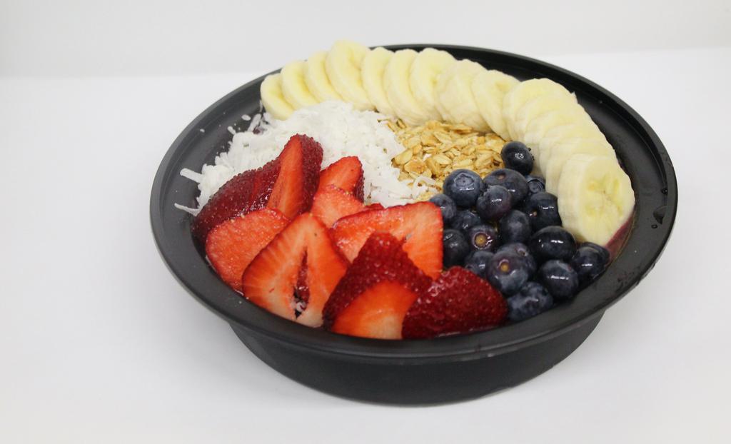Açaí Bowl · Açaí, strawberry, blueberry, banana, coconut milk, and agave topped with seasonal fruit, granola, and coconut flakes.