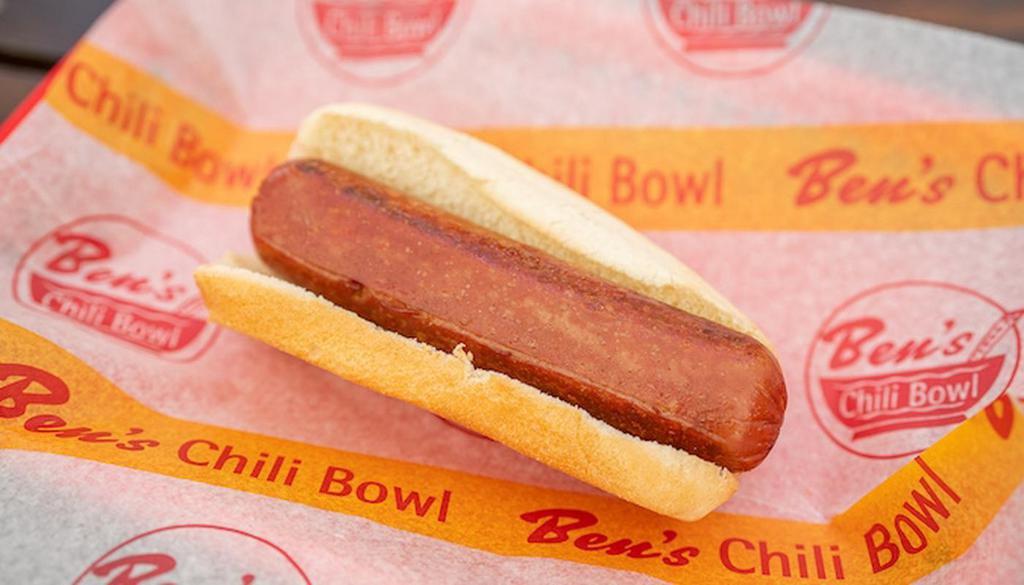 Jumbo Turkey Dog · Enjoy this junior Turkey Dog  served on a warm steamed bun with your choice of condiments.  We suggest mustard, onions and our spicy homemade chili sauce or our vegan veggie chili. (jumbo our out of stock)