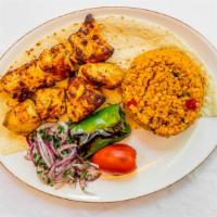 Char-Grilled Chicken Cubes · Char grilled chicken cubes seasoned with herbs and served with bulgur pilav, Ezme(Turkish Sa...