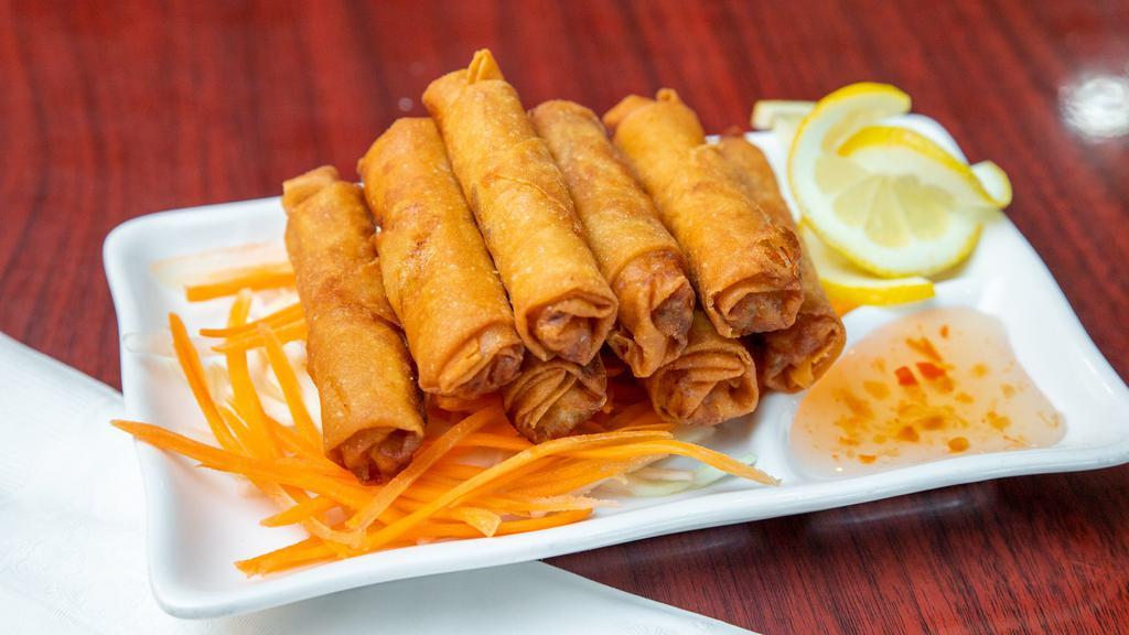 Fresh Spring Roll · Nime chow. Fresh lettuce, bean sprouts, sweet basil, shrimp and noodles rolled in soft rice paper. Served with peanut sauce.