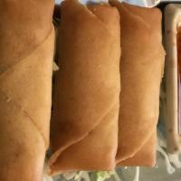 Vegetarian Spring Roll · Vegetarian. Glass noodles, cabbage, mushroom, and shredded carrot wrapped in a pastry shell ...