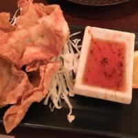 Crispy Angel · Chicken and shredded carrot wrapped in wonton skin. Served with a sweet chile dipping sauce.