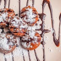 Fried Oreo’S · Served with a dusting of powdered sugar (powdered sugar served on the side for carryout).