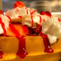 Strawberry Shortcake · Your choice of waffle, French toast, or hot cakes topped with sliced strawberries, whipped c...