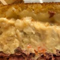 Grilled Corned Beef Special Sandwich · Made with coleslaw, Russian dressing, and Swiss cheese on grilled rye.