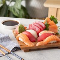 Sushi & Sashimi Combo · Three pieces tuna sashimi, three pieces salmon sashimi, two pieces tuna sushi, two pieces sa...