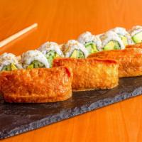 Vegetarian Combo · Avocado Cucumber Roll and 4 pieces tofu skin sushi.