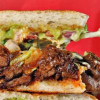 Torta · Toasted Mexican telera bread choice of one filling, refried beans, melted jack cheese, guac,...