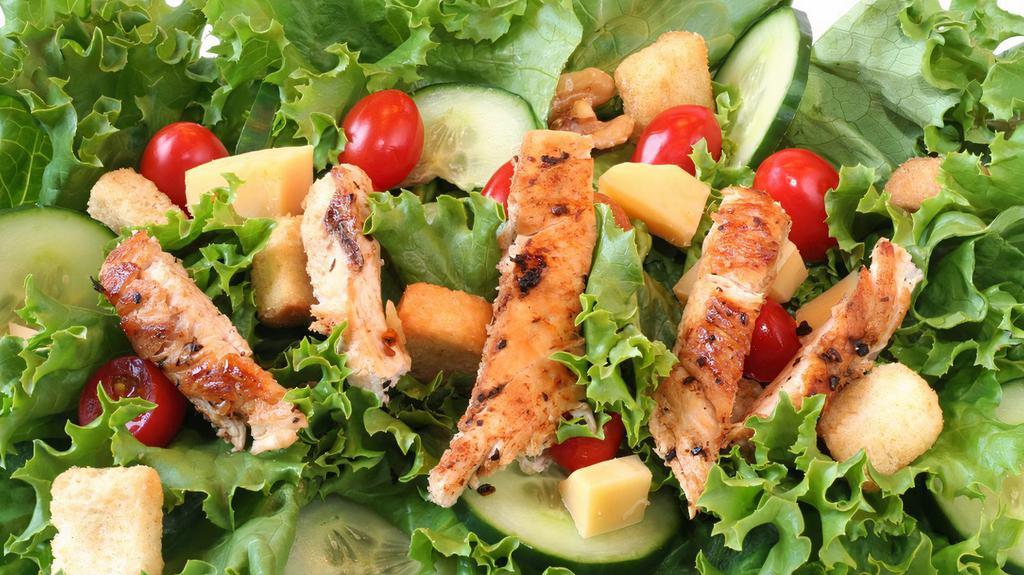Grilled Chicken Salad · Our signature salad! Chicken marinated in olive oil and select herbs and spices, grilled to order. Add feta cheese for an additional charge.