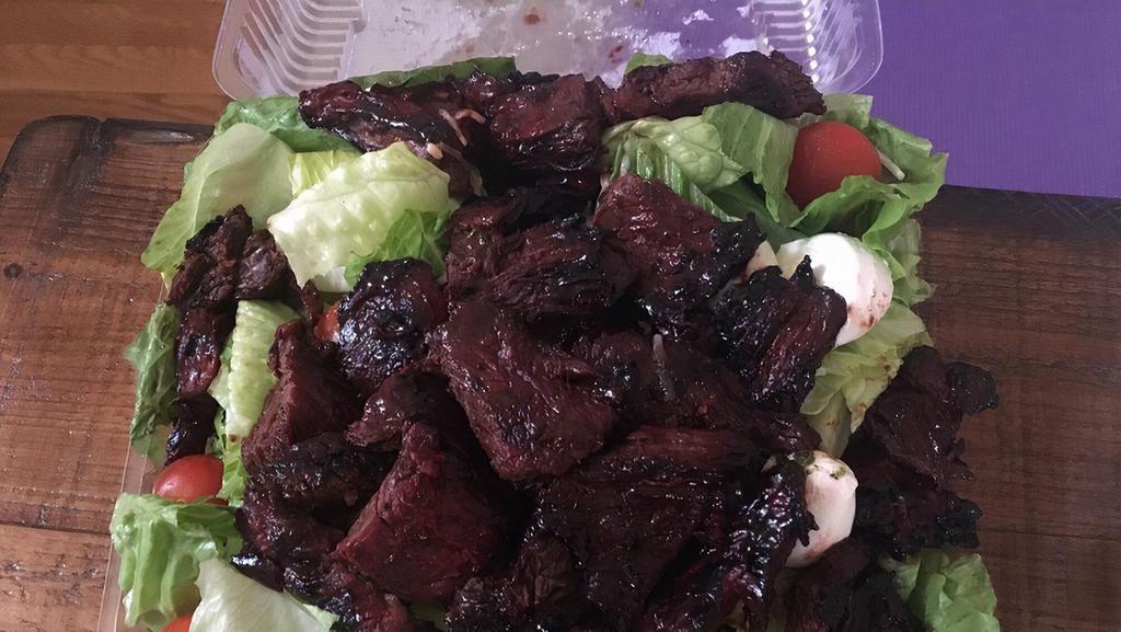 Grilled Steak Tip Salad · Marinated steak tips grilled to perfection. Served with your choice of salad.