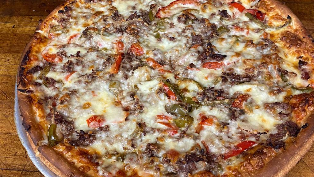 Philly Cheese Steak Pizza · Grilled steak, onions, peppers and american cheese.