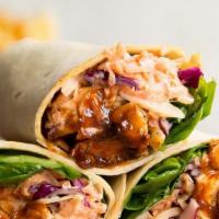 Chicken Stir-Fry Wrap · Marinated chicken stir-fried with fresh onions, peppers, mushrooms, broccoli and carrots. Yo...