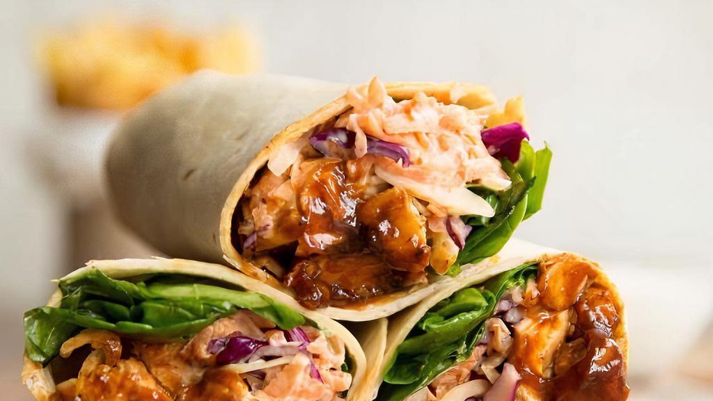 Chicken Stir-Fry Wrap · Marinated chicken stir-fried with fresh onions, peppers, mushrooms, broccoli and carrots. Your choice of sweet chili or teriyaki sauce.