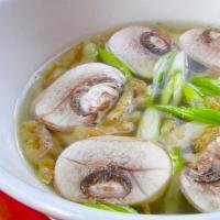 Mushroom Soup · Clear broth with mushroom and scallion.
