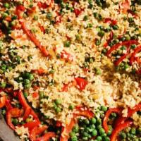 Veggie Paella · Veggie paella with peas, red bell pepper, mushroom, onion, tomato, garlic, olive oil. 

*Ple...