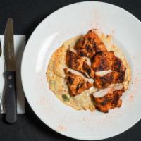 Blackened Chicken Pierogies · Pan fried potato and cheese stuffed pierogies in white wine cream sauce with bell peppers, a...