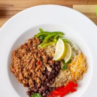 Beef Taco Bowl · Cilantro lime rice topped with seasoned black beans, southwest ground beef, onions and peppe...