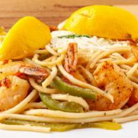 Shrimp Scampi · Marinated shrimp with onions, peppers, plum tomatoes, linguine in lemon cream sauce topped w...