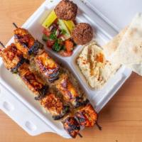 Chicken Kabob Platter · Marinated cubes of chicken marinated with herbs, spices, lemon juice and olive oil. Grilled ...