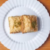 Baklava · Each philo dough stuffed with whole nuts and drizzled with simple syrup.