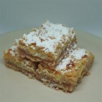 Lemon Bar · Our Lemon Bars begin with a sweet sugar cookie crust, topped with a lemony cream cheese fill...