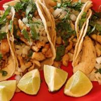 Tacos · All tacos are topped with chopped onions and cilantro. Your choice of corn or flour tortillas.