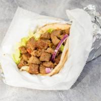 Lamb Gyro · Seasoned grilled lamb in a pita with lettuce, tomato, onion and choice of any or all white, ...