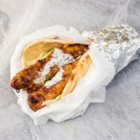 Kabab Gyro · Seasoned grilled kabab with lettuce, tomato, onion in a pita with choice of white, red, and ...