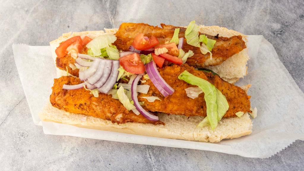 Fish Hoagie · Fried fish with lettuce, tomato, onion in a hoagie bun with choice of white, red, and green sauce.