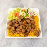  Lamb Over Rice · Seasoned grilled lamb  over Basmati Rice with Side Salad of lettuce, tomato, cucumber, and o...